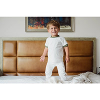 Green Dotted Kids Pajamas Weared by a boy